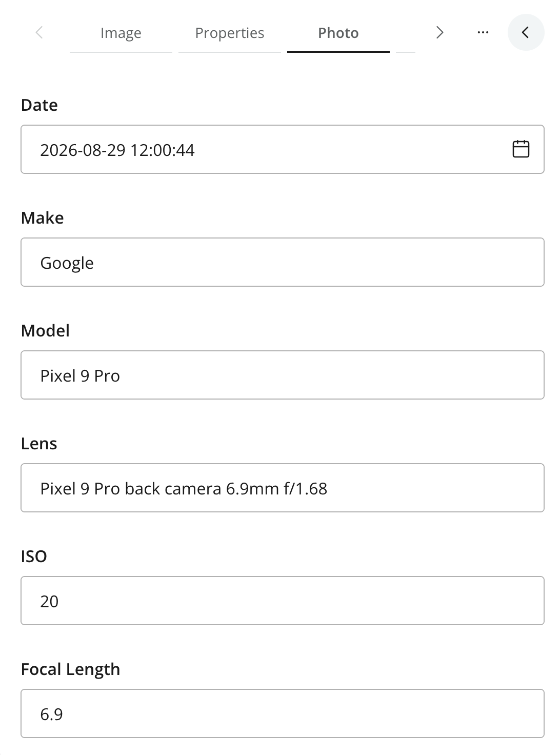 Photo tab with camera, lens, and exposure metadata