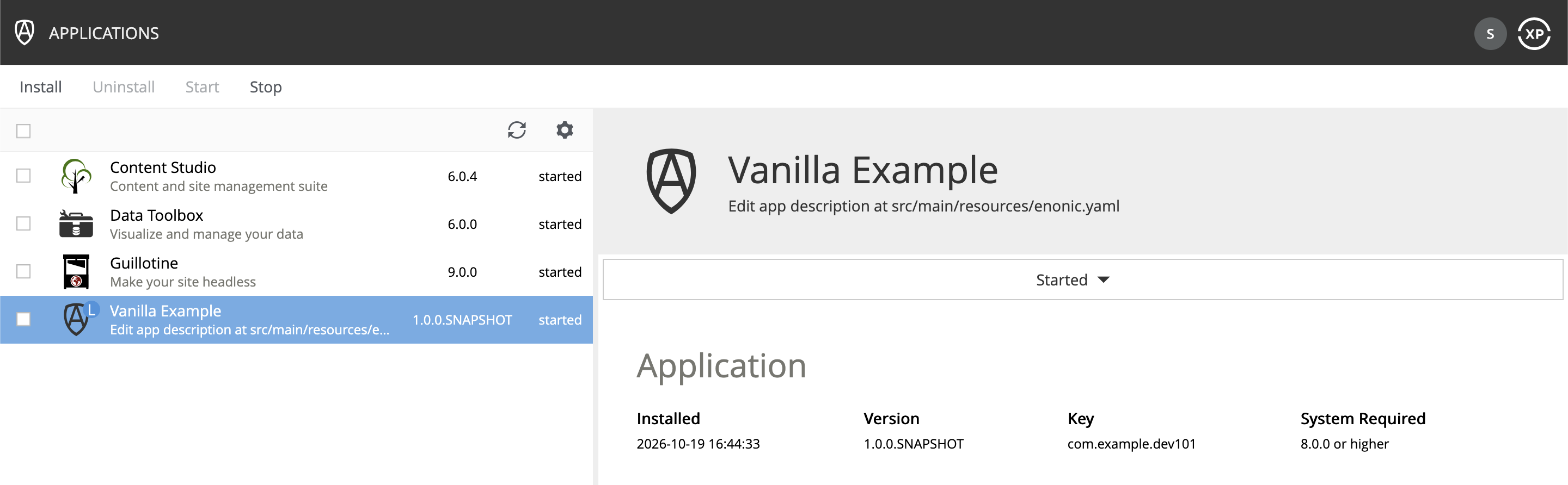 The Applications tool listing Content Studio, Data Toolbox, Guillotine and Vanilla Example, with Vanilla Example selected and its key com.example.dev101 shown